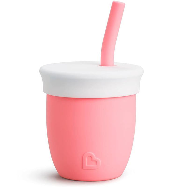 https://www.macrobaby.com/cdn/shop/files/munchkin-c-est-silicone-training-cup-with-straw-coral_image_1_grande.jpg?v=1701356411
