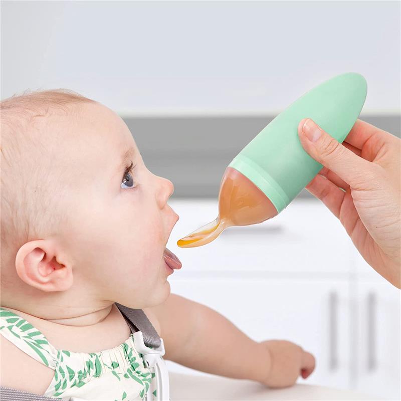 https://www.macrobaby.com/cdn/shop/files/tomy-squirt-silicone-baby-dispensing-spoon-mint_image_3.jpg?v=1703692316